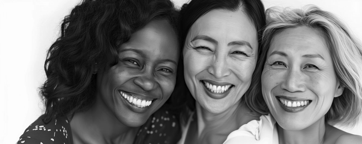 three older women looking at the camera